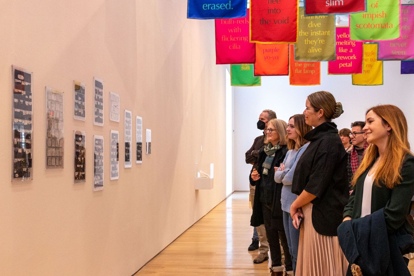 Crowd looking at the exhibition called Sympathy for the Translator the The Gund Gallery.